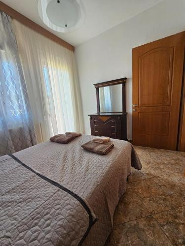 Ένα ή περισσότερα κρεβάτια σε δωμάτιο στο Sweet Dreams Villa