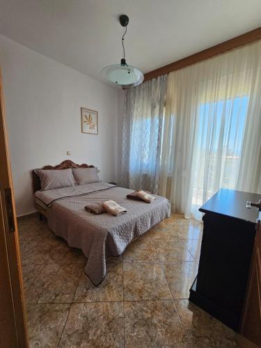 Ένα ή περισσότερα κρεβάτια σε δωμάτιο στο Sweet Dreams Villa