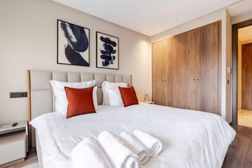 Katil atau katil-katil dalam bilik di Utopia Stays - Appartement Chic & Moderne Face Mer