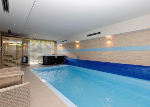 Πισίνα στο ή κοντά στο Buczki 12 SPA Mazury Pool