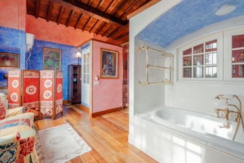 a bathroom with a large tub in a room at I Palpiti - Dream Villa in Florence in Florence