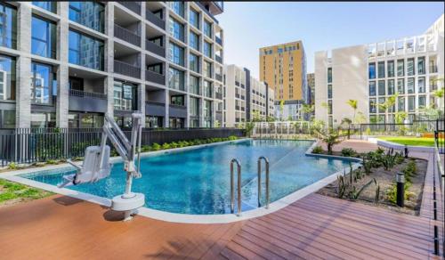 a swimming pool in the middle of a building at Nearby stadium & New 3b2b Apt & Free parking in Sydney