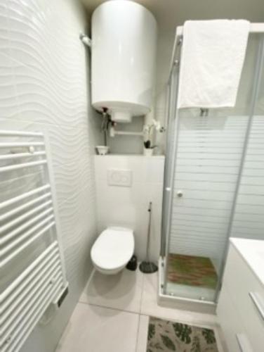 One bedroom behind Martinez