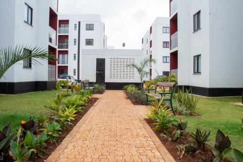 Κήπος έξω από το Chic 2BR Nairobi-Tatu City Suite