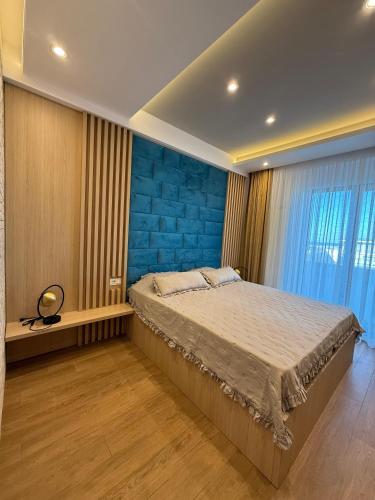 En eller flere senge i et værelse på Maribela Apartments