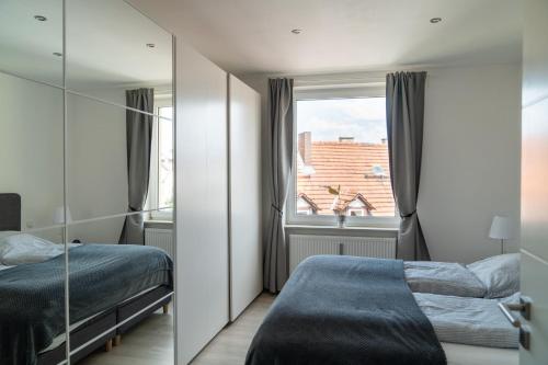 Ένα ή περισσότερα κρεβάτια σε δωμάτιο στο SOUL by Interior Apartments