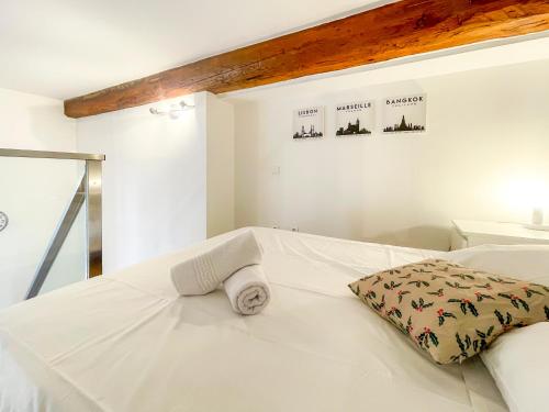 Ένα ή περισσότερα κρεβάτια σε δωμάτιο στο Place Massena 4 Pers AC WiFi