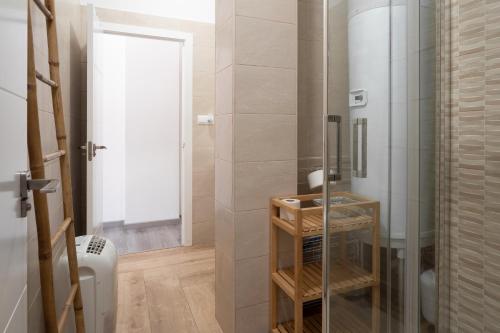 Ένα μπάνιο στο Apartamento Puertu Chicu