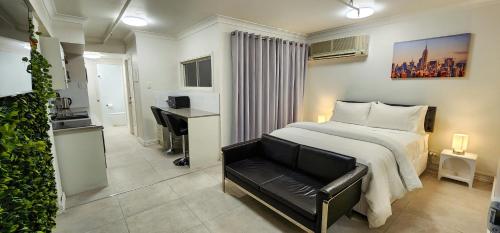 Ένα ή περισσότερα κρεβάτια σε δωμάτιο στο Apt 9 The New Yorker