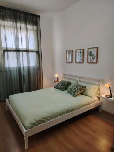 Postel nebo postele na pokoji v ubytování Caracalla House