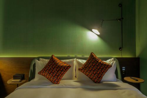Katil atau katil-katil dalam bilik di Neobridge Hotel