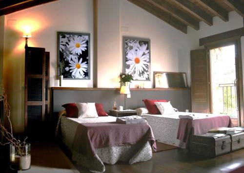 Posteľ alebo postele v izbe v ubytovaní El Hogar del Fresno casa con encanto en Cañicosa