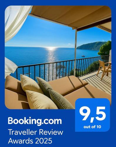 a view of the ocean from a balcony at Unparalleled sea view in Tossa de Mar
