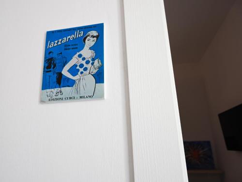 a poster of a woman on a door at Meravigliosalento in Squinzano