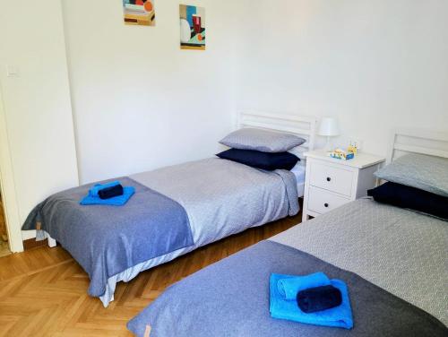 Ένα ή περισσότερα κρεβάτια σε δωμάτιο στο Seriola apartment