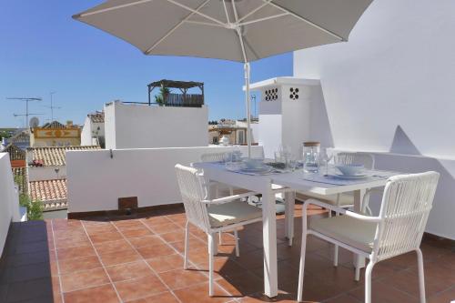Escape to a terrace over Tavira's history