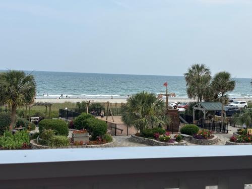 a view of the beach from the balcony of a resort at Breezy Corner in Myrtle Beach