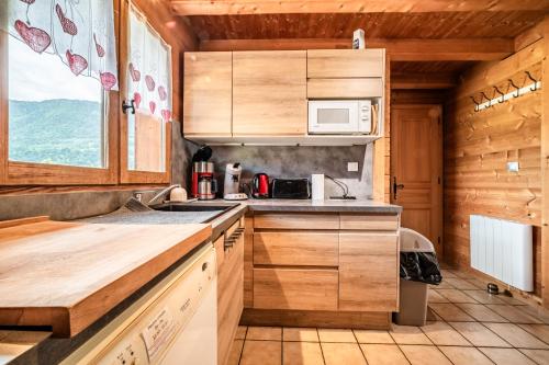 Kuchyň nebo kuchyňský kout v ubytování Chalet Marmottes
