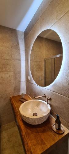 Et badeværelse på Appartement Cozy avec Clim, Balcon et Parking Gratuit