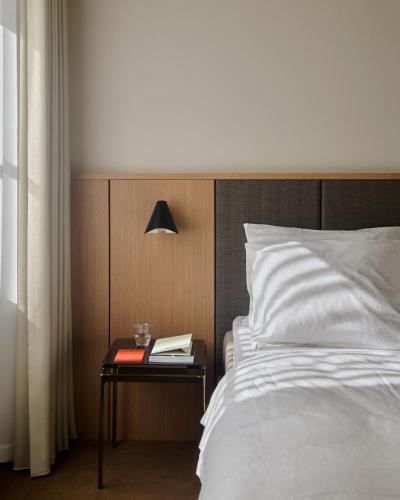 Postel nebo postele na pokoji v ubytování Hotel Petra