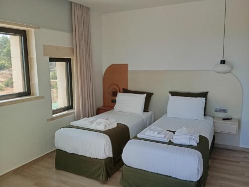 Postel nebo postele na pokoji v ubytování Afea Villas