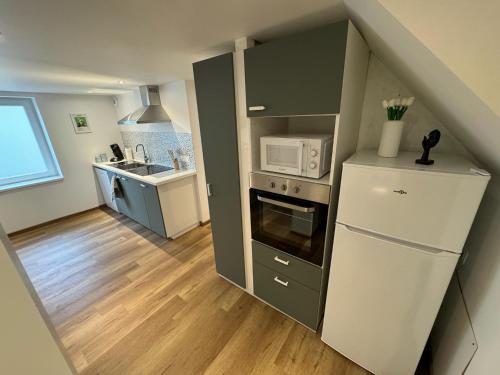 Kuchyň nebo kuchyňský kout v ubytování Maison Alsacienne Centre Alsace