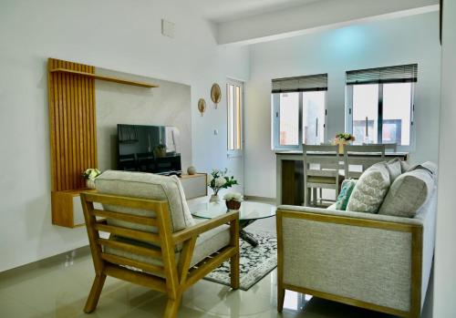 TV a/nebo společenská místnost v ubytování Apartamento Moderno