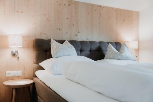 Aparthotel Steger Wagrainにあるベッド