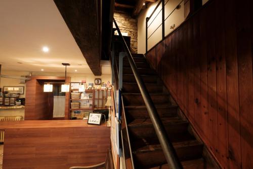 a staircase in a building with a sign on it at Hosteria de Zubiri in Zubiri