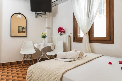 Posteľ alebo postele v izbe v ubytovaní Rooms Maria
