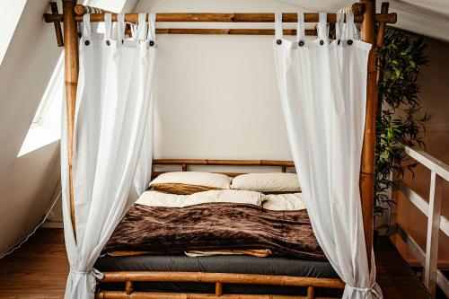Postel nebo postele na pokoji v ubytování Wellness Suite mit Whirlpool und Sauna
