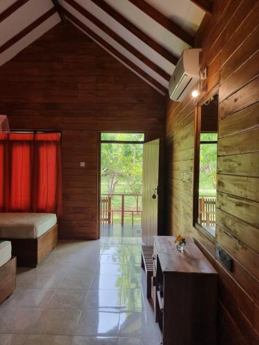 Postel nebo postele na pokoji v ubytování Liyon Rest sigiriya