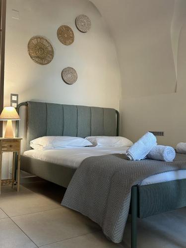 a bedroom with two beds in a room at Arch Residence, studio 3, Vroulidia in Katarráktis