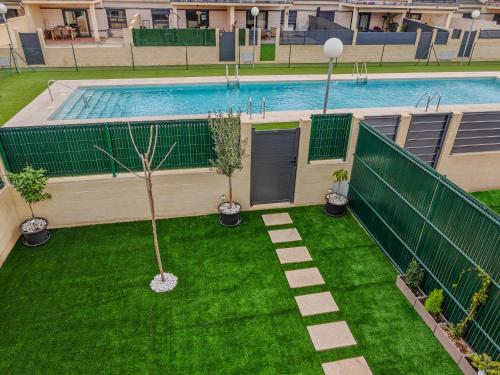 an overhead view of a yard with a swimming pool at The Garden House in Alicante