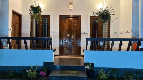 Imagen de la galería de Homestay INN Munnar, en Anachal