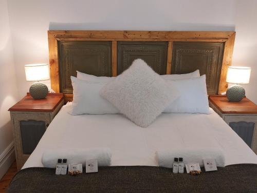 Giường trong phòng chung tại La Petite Maison de Grès