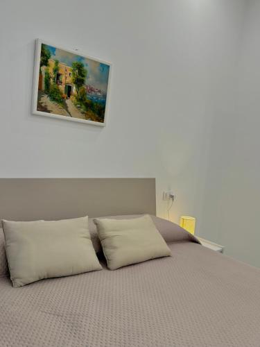 Ένα ή περισσότερα κρεβάτια σε δωμάτιο στο Luxury Magre