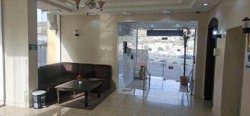 شركة العييري للشقق المخدومة الباحة Al-Eairy Serviced Apartments Company, Al Baha 2にあるシーティングエリア