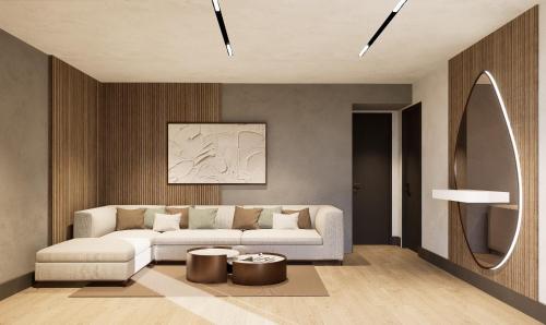a living room with a white couch and a mirror at Mövenpick Resort Antalya Tekirova - Ultra All Inclusive in Tekirova