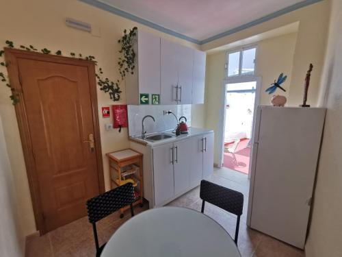Kuchyň nebo kuchyňský kout v ubytování Casa Sionna