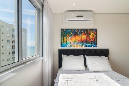 Postel nebo postele na pokoji v ubytování VAC - Condomínio beira mar na Praia de Itajubá