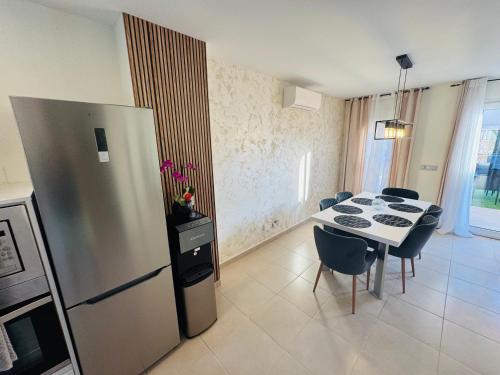 Calpe Casa adosada entorno playa y montaña tranquilidad relax jacuzzi piscina wifi aire jardin barbacoa y parking