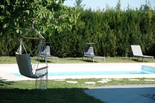 Photo de la galerie de l'établissement Maison au calme avec piscine privée, à Vert-le-Grand