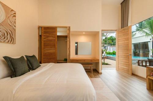 Postel nebo postele na pokoji v ubytování Dutch Villas Phuket