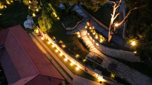 an overhead view of a street with lights at night at Chateau Du Comte 