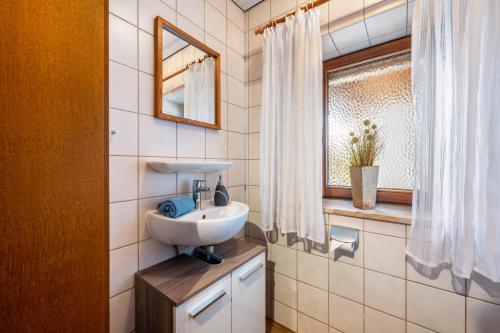 Ένα μπάνιο στο Ferienwohnung Köberich