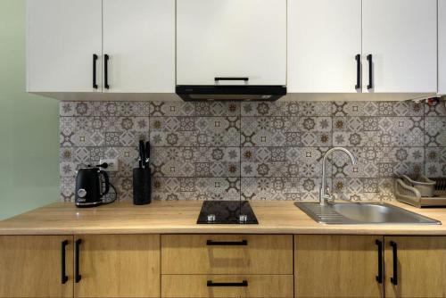 Dapur atau dapur kecil di Таун Тераса 3 поверхи by Willox