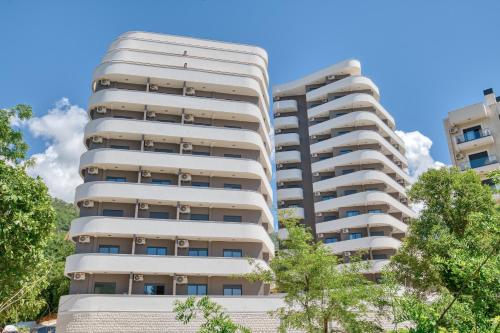 an image of an apartment building at Twin Towers LT Luxury in Becici