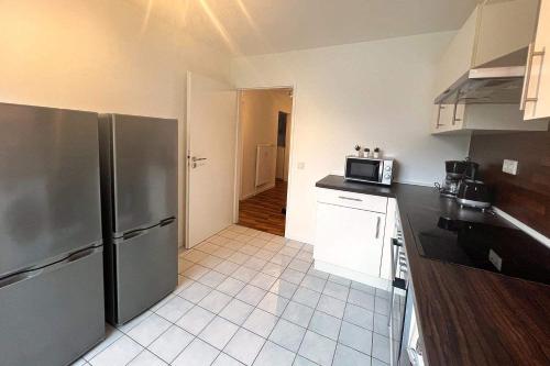 Kuchyň nebo kuchyňský kout v ubytování Work & Enjoy Apartments in Todendorf