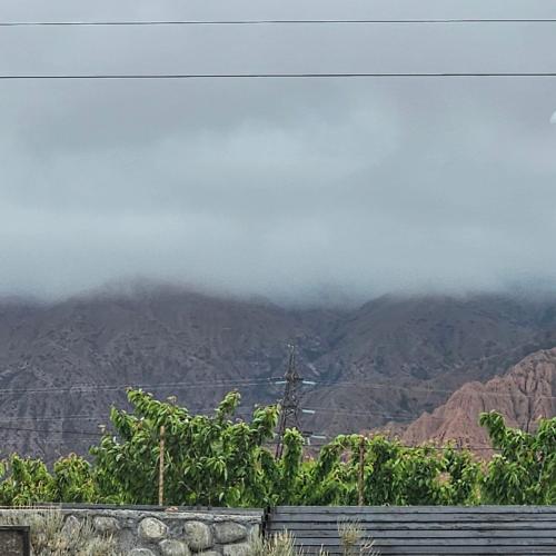 a view of the mountains with clouds in the sky at Casablanca in Kaji-Say
